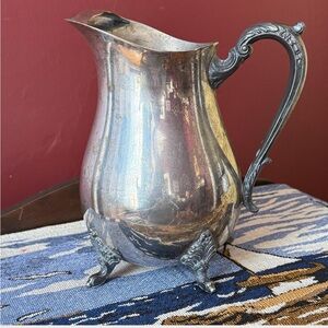 Elegant Silverplate Footed Pitcher with Ornate Handle Vintage